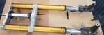 2006 Kawasaki Ninja ZX6R Fork Suspension Set With Both Holders Oem. Fixed Price $450.00.