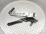2011 09-20 Triumph Thunderbird Front Right Rearset Foot Peg Rest Bracket. Fixed Price $111.24.