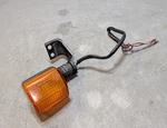 Suzuki DR350SE Front Left Turn Signal Flasher Light & Bracket. Fixed Price $35.00.