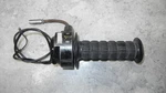 1974 Kawasaki F7 175 Throttle Assembly With Off Run Switch 46018-036. Fixed Price $55.00.