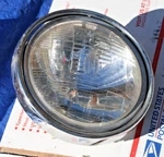1977 Kawasaki Oem Headlight (see Below) Vin # KE250B-003377. Fixed Price $93.87.
