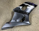 2003-2004 Suzuki GSXR1000 Oem Left Fairing Plastic Grey Clean Original 94471-18G. Fixed Price $120.00.